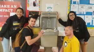 students with water filling station