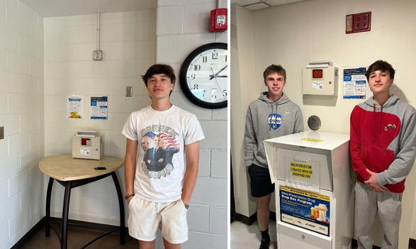 Students standing beside disposal bins